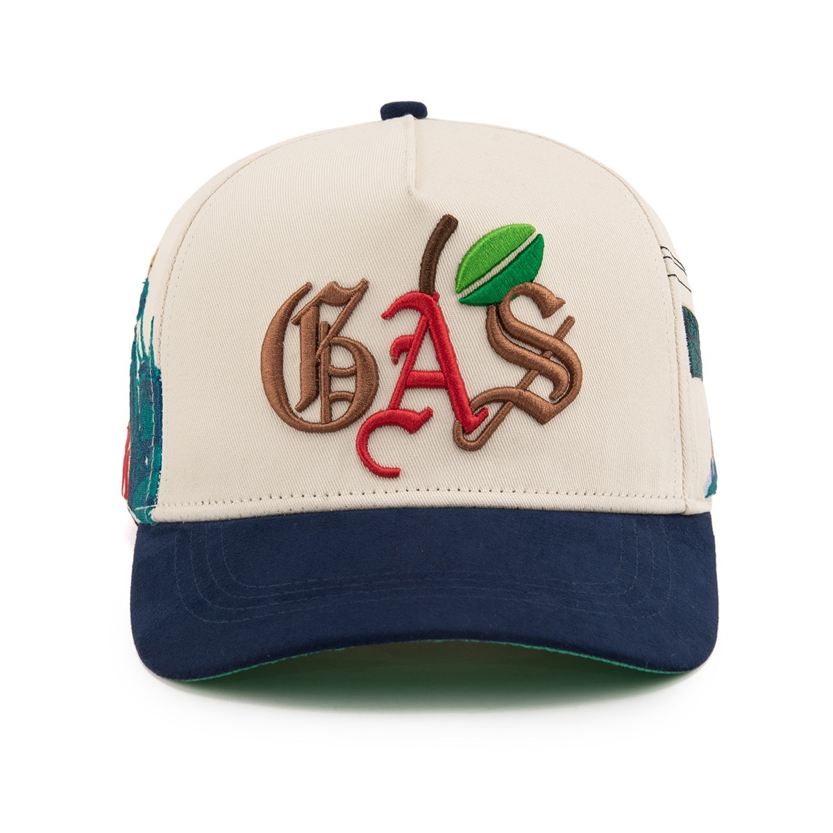 GAS NYC cream cap with brown blackletter GAS embroidery, red script detail, embroidered fruit graphic and navy suede brim